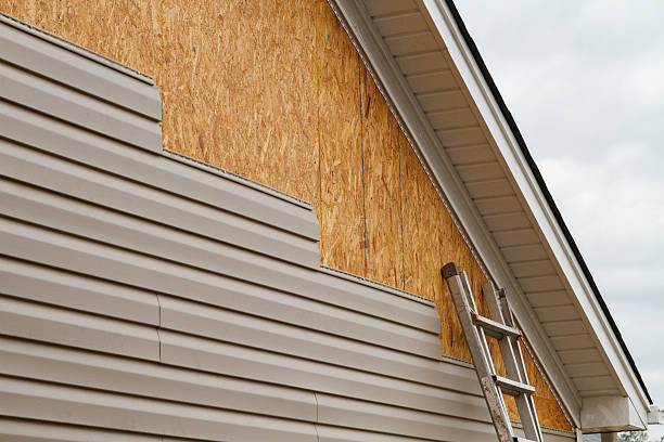 Professional Siding Installation technician working in Fort Meade, MD